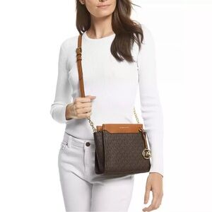 Michael Kors Brown Crossbody Bag with Adjustable Strap and Textured Material